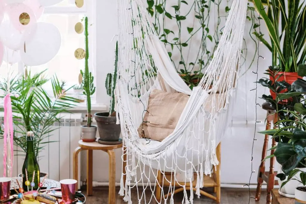 tropical decor staycation ideas: hammock & tropical plants